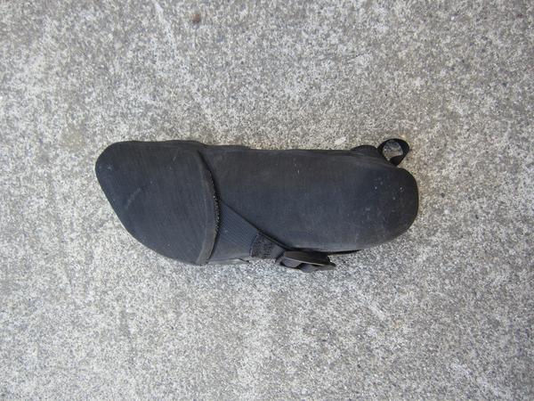 Prototype sole with adjustment strap visible.