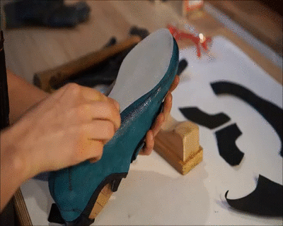 Applying a midsole in preparation to thermoform it.